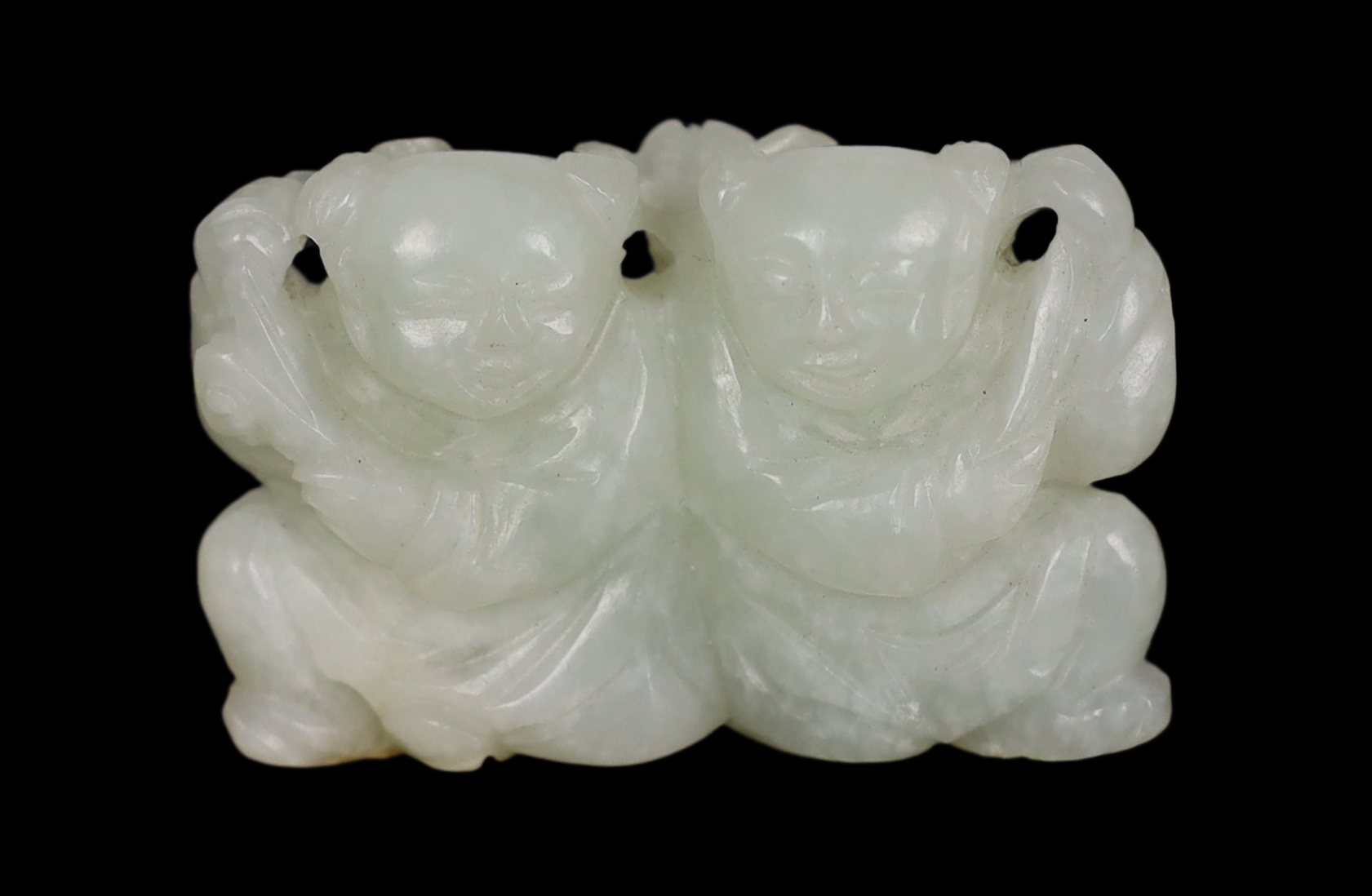 A Chinese pale celadon jade carving of the He He Erxian twins, 18th/19th century